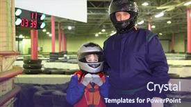  Presentation with cars racing - Audience pleasing theme consisting of 2 cars racing - little boy and his carting backdrop and a navy blue colored foreground