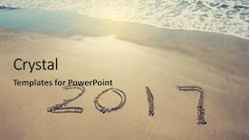  Presentation with footprints and sand beach - Amazing PPT theme having 2017 written in sand write backdrop and a soft green colored foreground