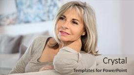  Presentation with home - Beautiful presentation design featuring 50 years - smiling senior woman sitting backdrop and a mint green colored foreground