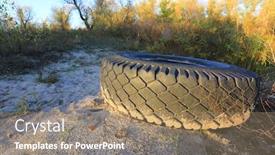  Presentation with tire - Slide set consisting of abandoned-tire-on-sand background and a coral colored foreground