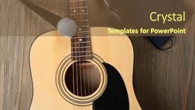  Presentation with acoustic - Slide set consisting of acoustic guitar headphones notebook and microphone on wooden background close up background and a tawny brown colored foreground