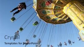 Presentation with photo - Audience pleasing PPT theme consisting of action photo of carousel backdrop and a light blue colored foreground