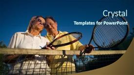  Presentation with court - Presentation consisting of active senior couple is posing on the tennis court with tennis racket in hand outdoor sunlight background and a ocean colored foreground