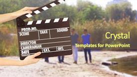  Presentation with economics production - PPT theme consisting of actor - operator holding clapperboard background and a violet colored foreground
