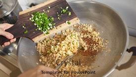  Presentation with movement - Audience pleasing PPT layouts consisting of adding scallion into the fried rice while stirring it with spatula movement blur noticeable backdrop and a coral colored foreground