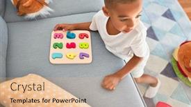  Presentation with learning - Amazing PPT theme having adorable-african-american-toddler-learning backdrop and a coral colored foreground