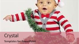  Presentation with baby christmas - Theme enhanced with adorable baby boy wearing a santa hat and red bow tie delighted with christmas he's sitting wrapped in christmas garland isolated on gray background and a coral colored foreground