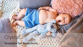  Presentation with doll - Amazing PPT theme having adorable baby lying down on the sofa over blanket at home newborn relaxing and resting comfortable with doll backdrop and a soft green colored foreground