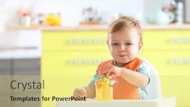  Presentation with baby sitting - Slides with adorable-baby-with-rattle-sitting background and a yellow colored foreground