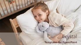  Presentation with doll - Slide set having adorable-blonde-girl-hugging-rabbit background and a soft green colored foreground