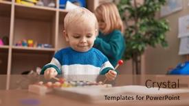  Presentation with xylophone - Presentation theme with adorable-boy-and-girl-playing background and a coral colored foreground