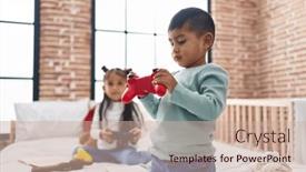  Presentation with video game - Presentation theme with adorable-boy-and-girl-playing background and a coral colored foreground