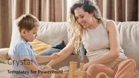  Presentation with wooden toy - Presentation theme enhanced with adorable-boy-putting-wooden-cubes background and a coral colored foreground