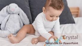  Presentation with baby toy - Presentation with adorable-caucasian-baby-playing background and a mint green colored foreground