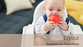  Presentation with baby sitting - Theme featuring adorable-caucasian-baby-sucking-ball background and a soft green colored foreground