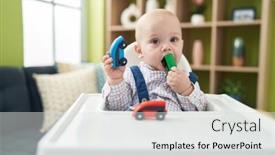 Presentation with baby toy - PPT theme enhanced with adorable-caucasian-baby-sucking-car background and a light gray colored foreground