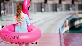  Presentation with flamingo - Audience pleasing PPT theme consisting of adorable-girl-with-inflatable-pink backdrop and a coral colored foreground