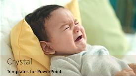  Presentation with baby crying - Theme consisting of adorable-hispanic-baby-lying background and a yellow colored foreground