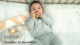  Presentation with baby toy - Slide set enhanced with adorable-hispanic-baby-lying background and a light gray colored foreground