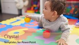  Presentation with baby - Presentation design enhanced with adorable-hispanic-baby-playing and a  colored foreground