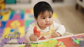  Presentation with baby blocks - Theme enhanced with adorable-hispanic-baby-playing background and a coral colored foreground