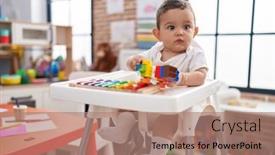  Presentation with xylophone - PPT layouts consisting of adorable-hispanic-baby-sitting background and a coral colored foreground