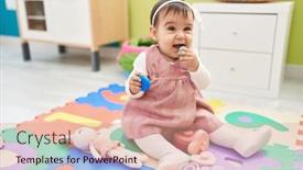  Presentation with baby toy - Presentation design with adorable-hispanic-baby-sitting background and a coral colored foreground