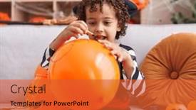  Presentation with balloon - Presentation theme featuring adorable-hispanic-boy-having-halloween background and a red colored foreground