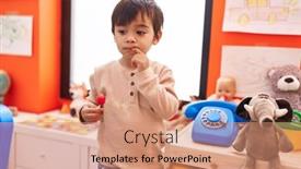  Presentation with lollypop - PPT theme having adorable-hispanic-boy-holding-lollypop background and a coral colored foreground