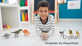  Presentation with kindergarten - Presentation theme enhanced with adorable-hispanic-boy-playing background and a white colored foreground