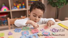  Presentation with kindergarten - PPT theme featuring adorable-hispanic-boy-playing background and a coral colored foreground
