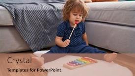  Presentation with xylophone - PPT theme with adorable-hispanic-toddler-playing-xylophone background and a coral colored foreground