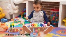  Presentation with xylophone - Presentation theme having adorable-hispanic-toddler-playing-xylophone background and a  colored foreground