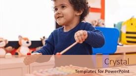  Presentation with xylophone - Theme featuring adorable-hispanic-toddler-playing-xylophone background and a  colored foreground