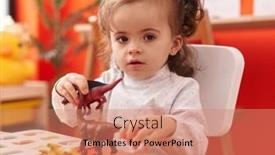  Presentation with pediatrics toddler - PPT theme consisting of adorable-hispanic-toddler-playing background and a coral colored foreground