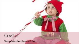  Presentation with christmas elf - Audience pleasing theme consisting of adorable toddler holding a giant candy cane while wearing a christmas elf costume isolated on white backdrop and a coral colored foreground