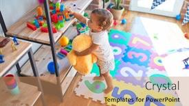  Presentation with doll - Theme having adorable-toddler-holding-duck-doll background and a coral colored foreground