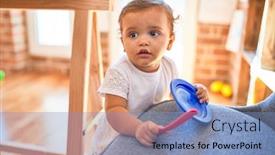  Presentation with cutlery - Beautiful slides featuring adorable-toddler-playing-with-plastic backdrop and a light blue colored foreground