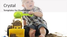  Presentation with bulldozer - Amazing presentation having adorable young preschooler happily looking up as he dumps sand onto his toy bulldozer on a white background backdrop and a light gray colored foreground
