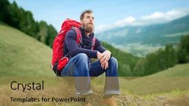  Presentation with adventure - Amazing presentation having adventure travel tourism hike and people concept - smiling man with red backpack sitting on ground over alpine hills background backdrop and a coral colored foreground