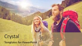  Presentation with adventure - PPT theme enhanced with adventure travel tourism hike and people concept - smiling couple walking with backpacks over alpine mountains and hills background background and a yellow colored foreground