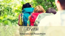  Presentation with travel friends - Presentation featuring adventure travel tourism hike and people concept - close up of friends walking with backpacks in woods from back background and a soft green colored foreground