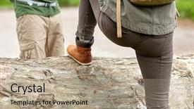  Presentation with woods - Amazing slide set having adventure travel tourism hike and people concept - close up of couple with backpacks walking and climbing over fallen tree trunk in woods backdrop and a coral colored foreground