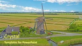  Presentation with windmill - PPT layouts having aerial from a traditional windmill in the countryside from the netherlands background and a tawny brown colored foreground