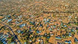  Presentation with aerial - Beautiful theme featuring aerial-panorama-of-tlokweng-suburbia backdrop and a coral colored foreground
