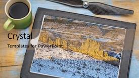  Presentation with rotor - Cool new PPT theme with aerial photography concept - reviewing aerial picture on a digital tablet with a drone rotor propeller and a cup of coffee - rock formation in rocky mountains foothills backdrop and a coral colored foreground