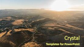  Presentation with arizona sunset view - PPT layouts featuring aerial view of suburban hills background and a tawny brown colored foreground