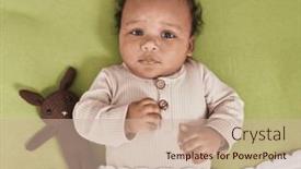  Presentation with african american baby - PPT theme featuring african-american-baby-relaxing background and a coral colored foreground