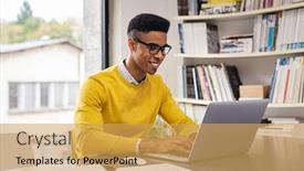  Presentation with home office - Theme enhanced with african-american-businessman-using-laptop background and a yellow colored foreground