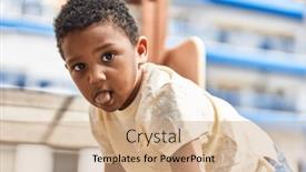  Presentation with playground - PPT theme consisting of african-american-child-playing background and a coral colored foreground